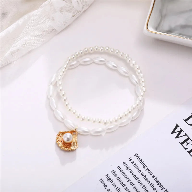 Modyle New Fashion Bohemian Simulated Pearl Chain Wedding Anklet Bracelet for Women Gold Color Shell Pendant Anklet Jewelry Gift