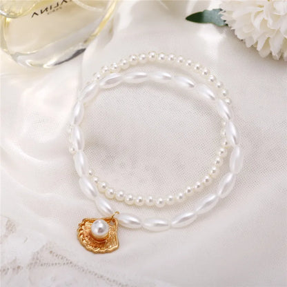 Modyle New Fashion Bohemian Simulated Pearl Chain Wedding Anklet Bracelet for Women Gold Color Shell Pendant Anklet Jewelry Gift