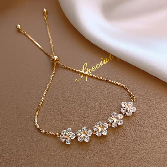 Eleganti braccialetti coreani con strass intarsiati Bracciale con ciondoli a fiori color oro per accessori per gioielli di moda da donna, regali per feste