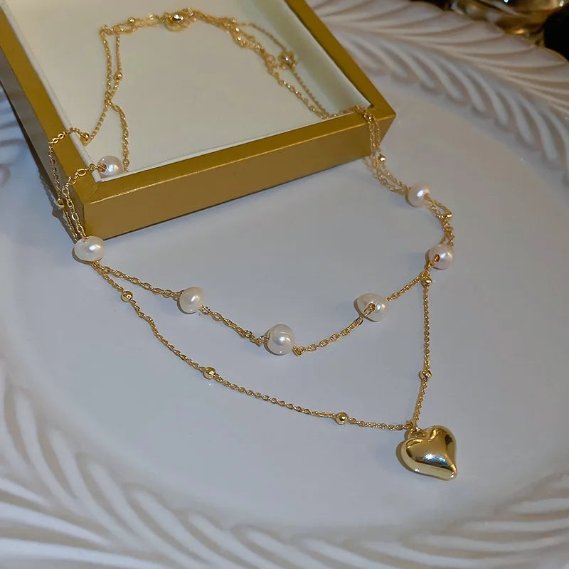 Design unico alla moda, elegante e squisito, collana con ciondolo a forma di amore, perla a doppio strato, gioielli da donna, regalo premium per la festa nuziale