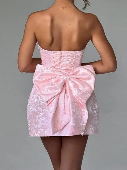 Abito corto impreziosito da fiocco senza maniche con stampa in pizzo di raso Elegante mini abiti da donna con spalle scoperte senza schienale Abiti da festa per banchetti